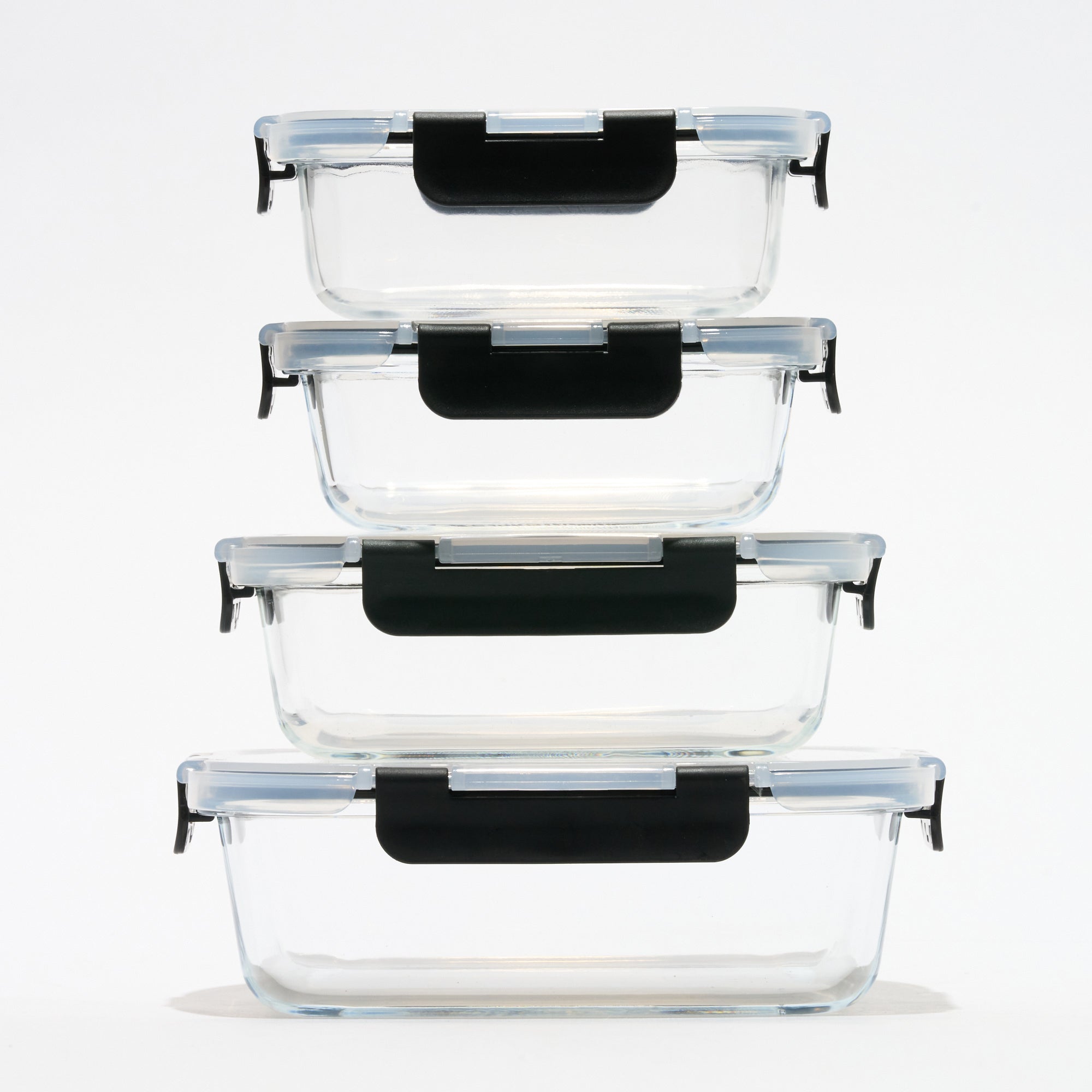 Stack of four empty rectangular Storinity glass storage containers