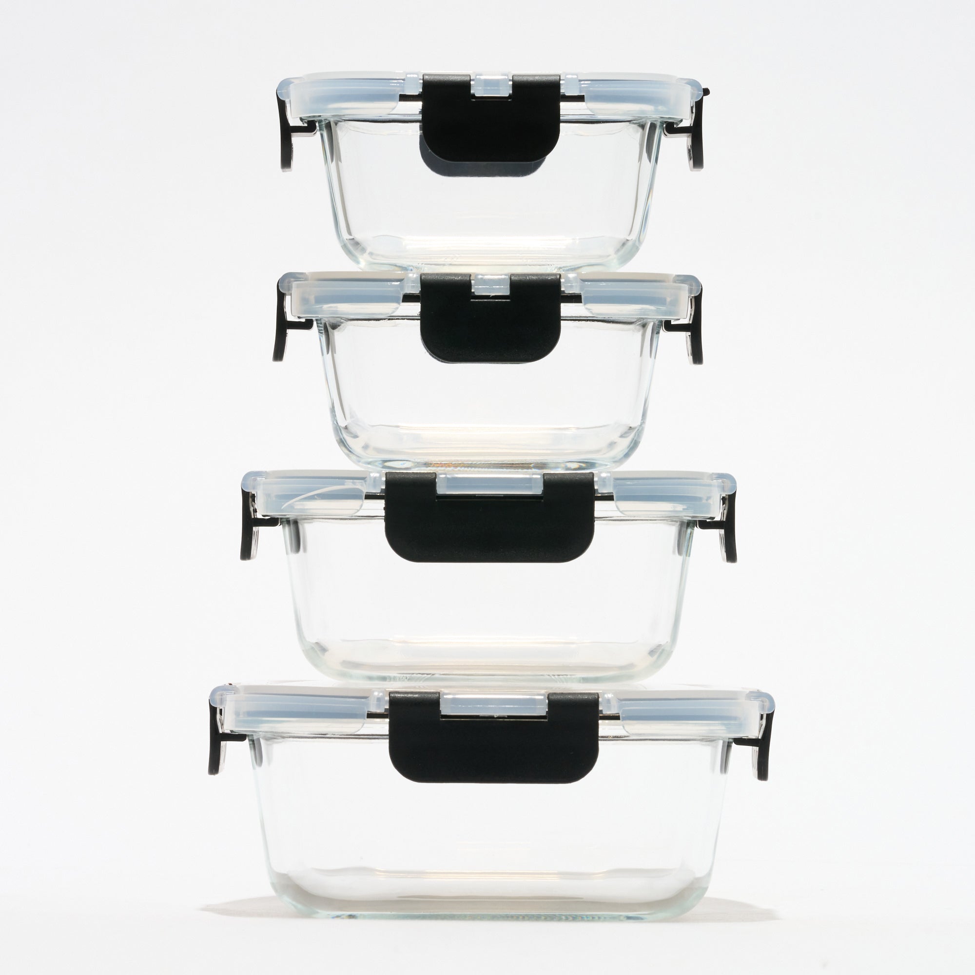Stack of four empty square Storinity glass storage containers