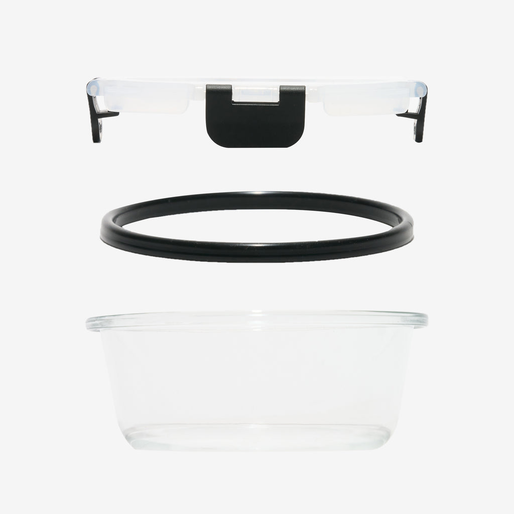 Exploded view of a Storinity glass container's lid, silicone gasket seal and glass base
