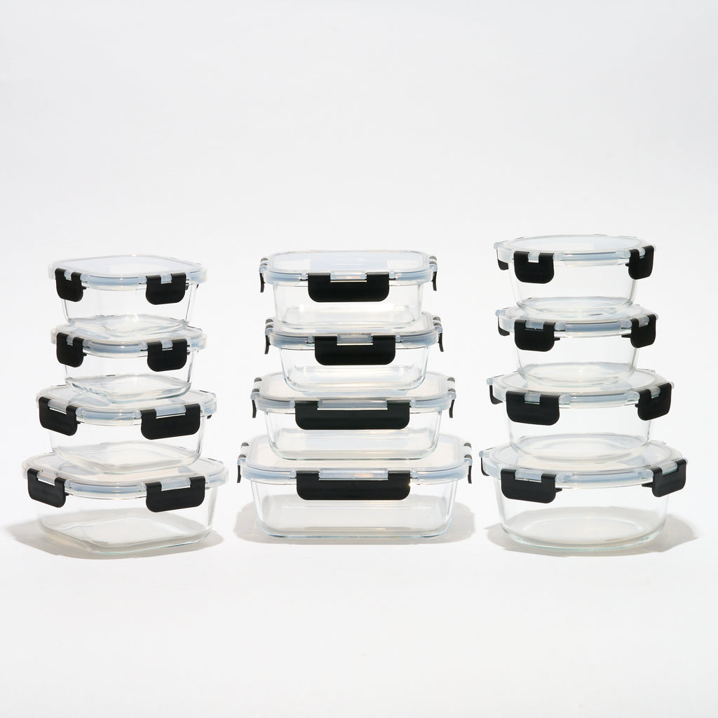 The full Storinity 24-Piece Air Tight Glass Storage Container set, empty, grouped by square, rectangular and round shapes