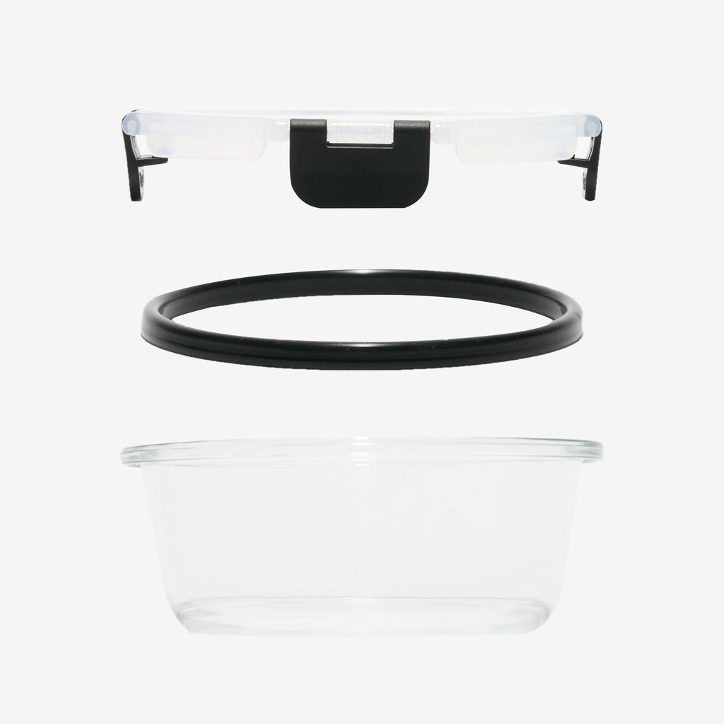 Exploded view of a Storinity glass container's lid, silicone gasket seal and glass base