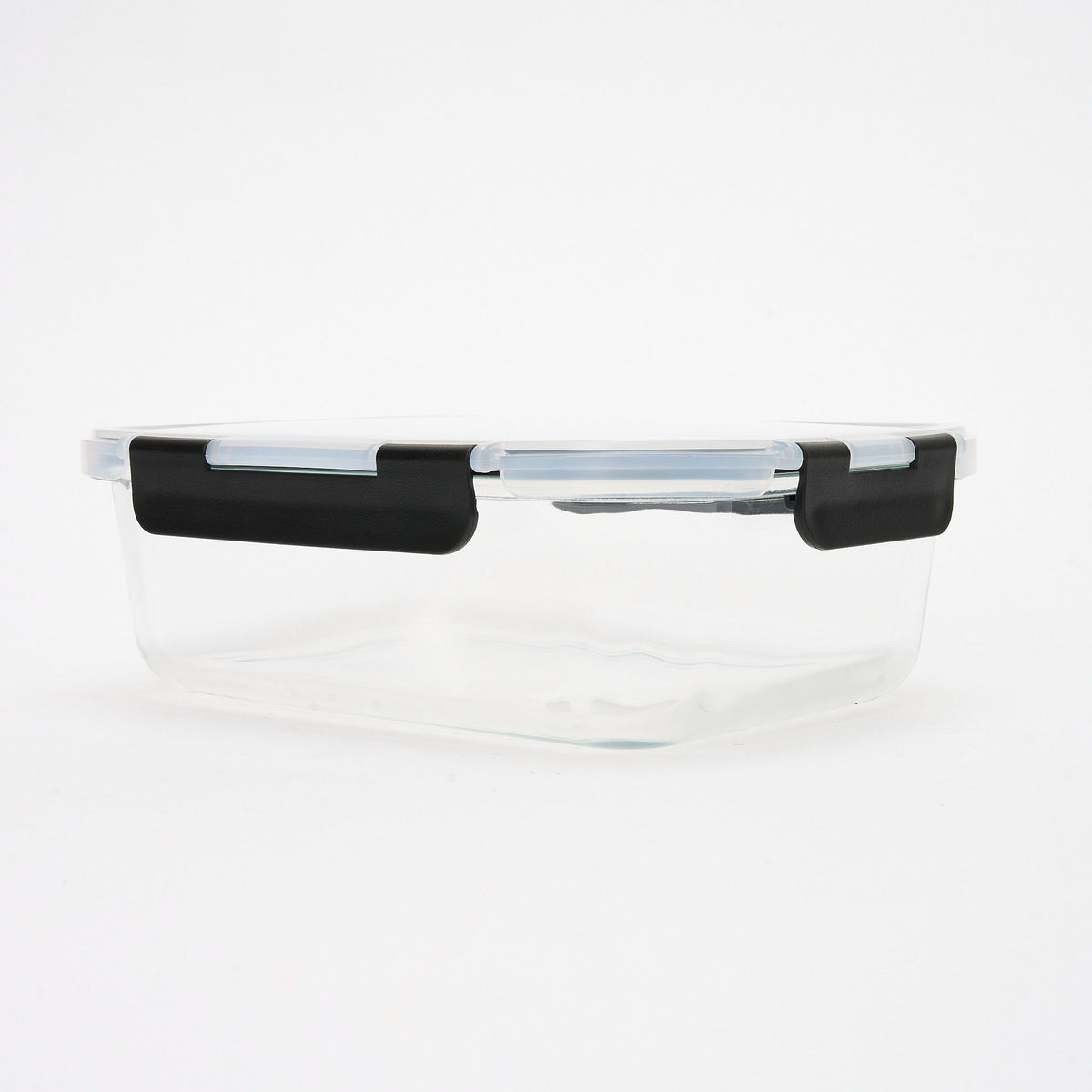 Empty rectangular Storinity glass container with black locking lid closed, front view