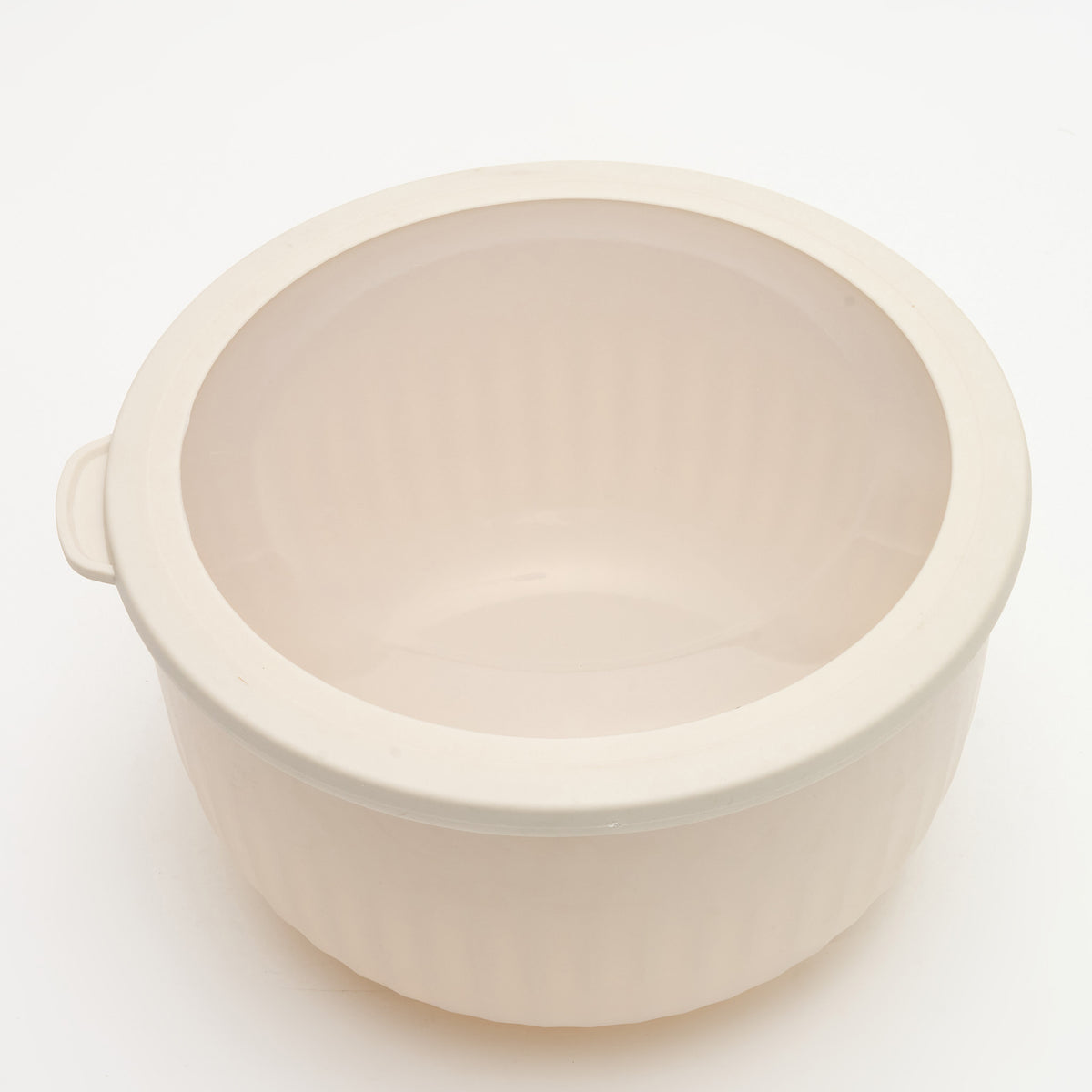 The largest Storinity nesting bowl, empty and without its lid, overhead view showing the handles