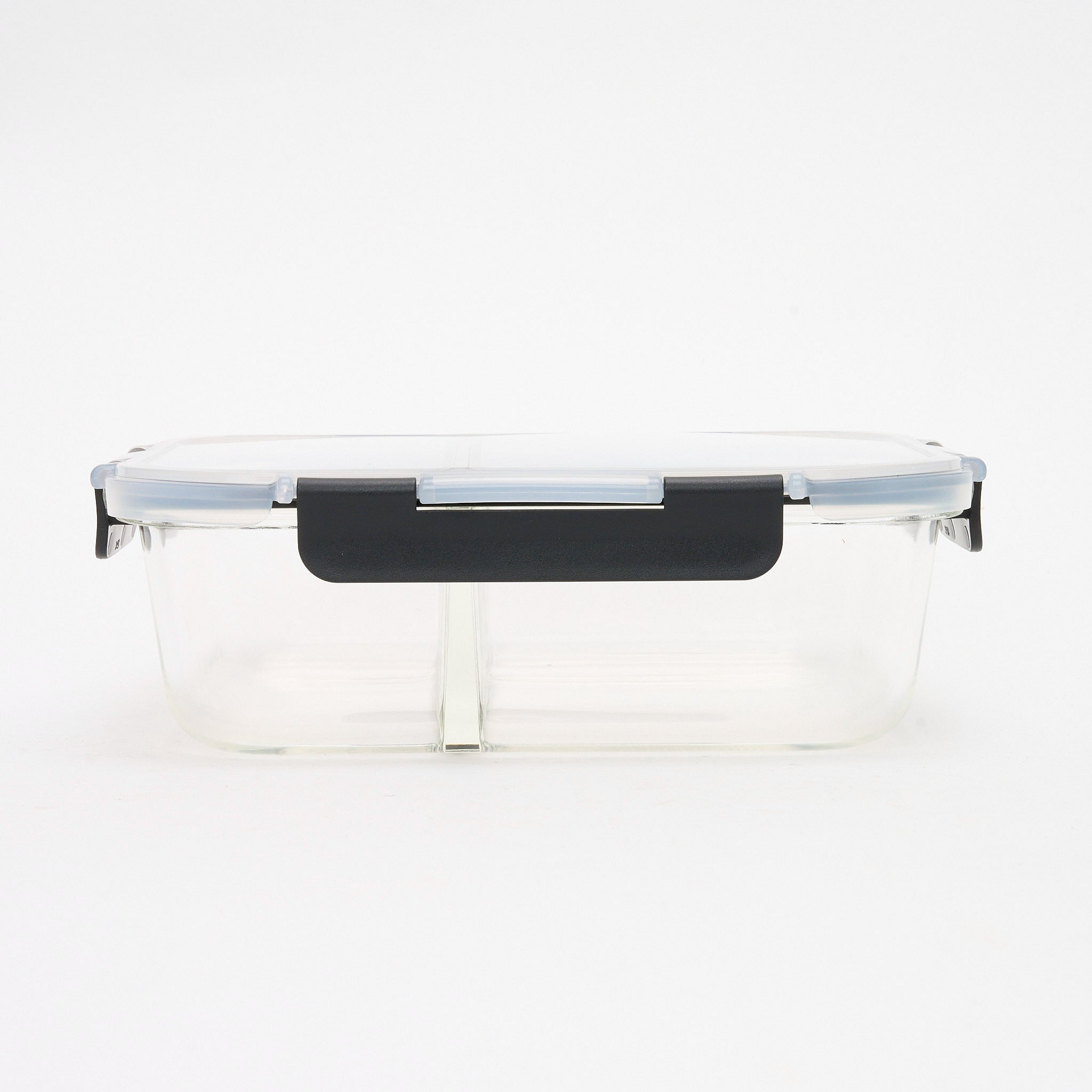 Empty Storinity divided glass container with locking lid closed, front view