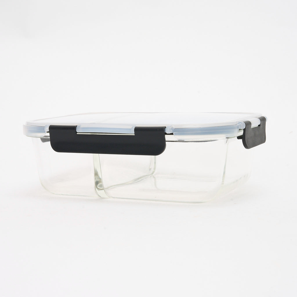 Empty Storinity divided glass container with locking lid closed, angled view